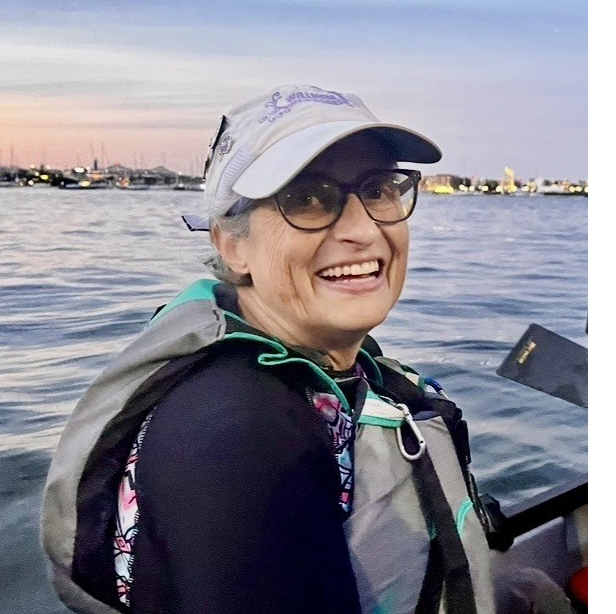 Jessica Goldhirsch on a boat smiling
